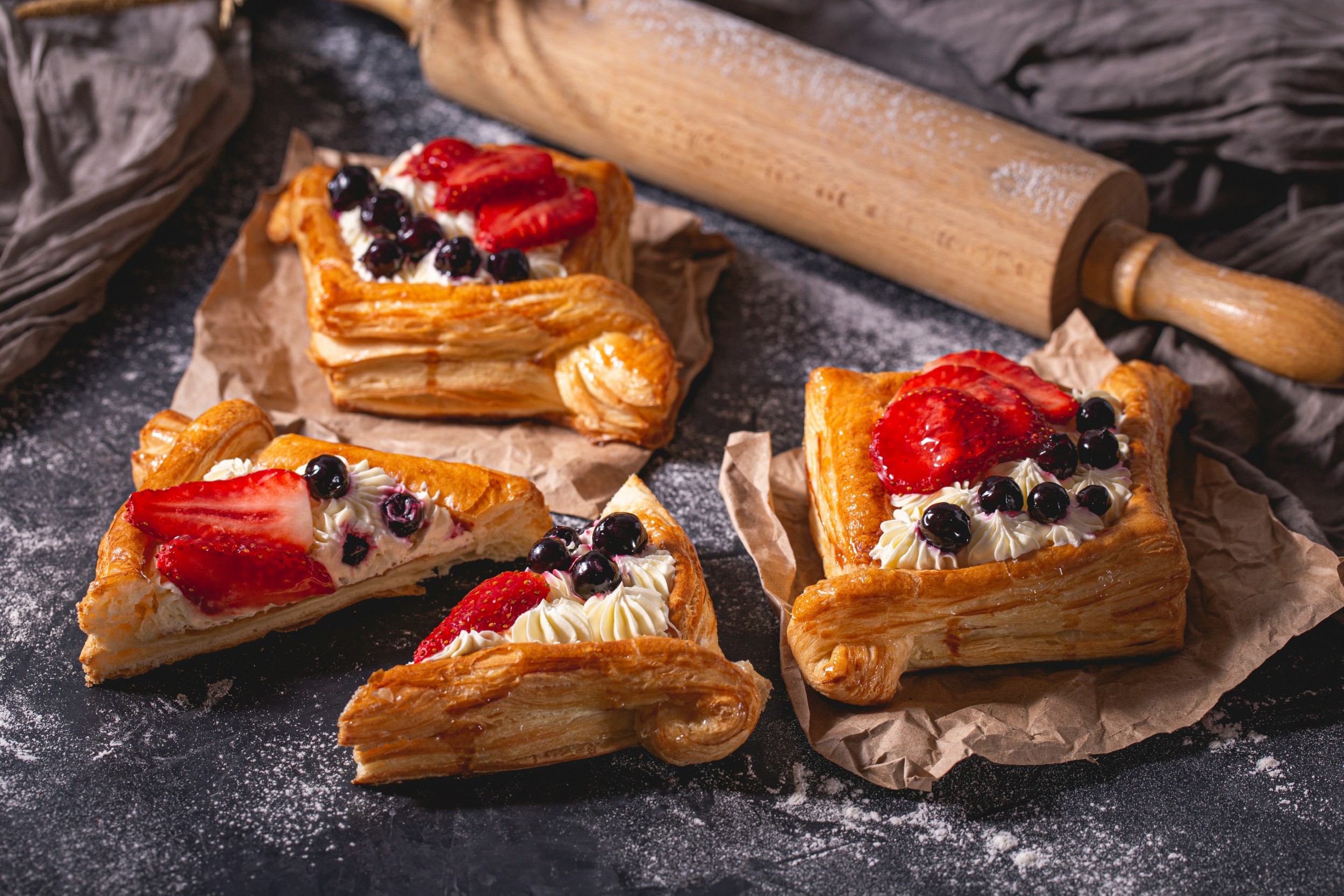 Fruit puff pastry tarts with strawberries and blueberries from a pastry class